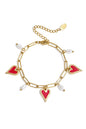Schakel armband met parels en hart charms