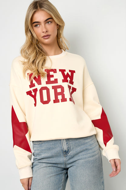 New York sweater met ster